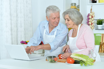 Image showing senior man and woman  in the kitchen