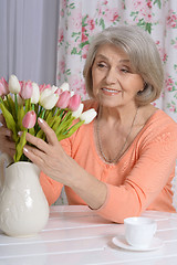 Image showing mature woman drinking tea