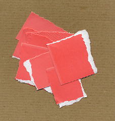 Image showing Red Torn paper pieces