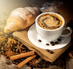 Image showing Morning coffee and croissant