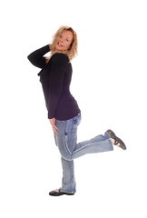Image showing Middle age woman in jeans.