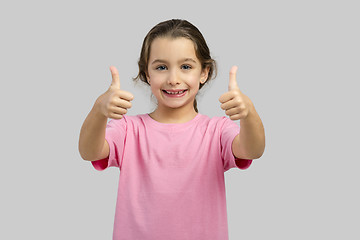 Image showing Happy girl with thumbs up