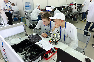 Image showing School students program the robot. Tyumen. Russia