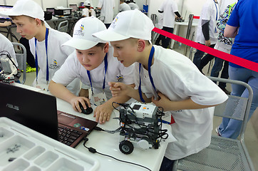 Image showing School students program the robot. Tyumen. Russia