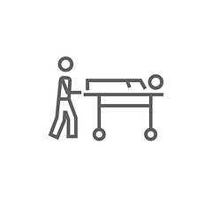 Image showing Man pushing stretchers line icon.