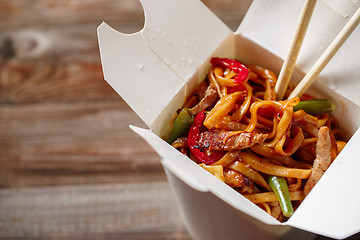 Image showing Asian noodles with fresh green onion and boiled egg