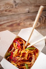 Image showing Asian noodles with fresh green onion and boiled egg