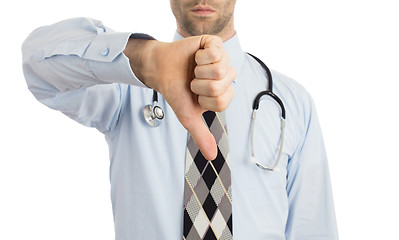 Image showing Caucasian male doctor making a dislike gesture