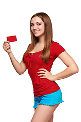 Image showing Smiling girl showing red card in hand