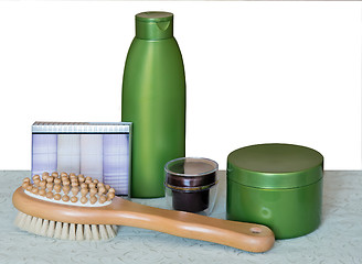 Image showing Brush massage and cream for skin care.