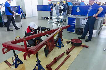 Image showing Young mechanic passes competition stage.Tyumen