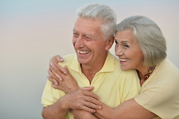 Image showing elderly couple  on the background of sky