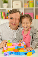 Image showing happy family playing at home