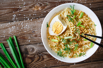 Image showing Asian noodles with fresh green onion and boiled egg