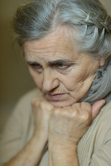 Image showing  Sad aged woman