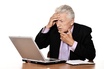 Image showing Old businessman working