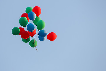 Image showing Colorful balloons in blue sky