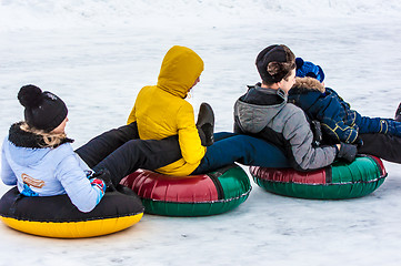 Image showing Baby winter sledding on the Ural River