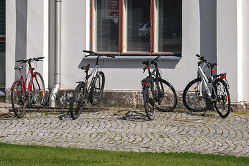 Image showing Bikes on the sidewalk.