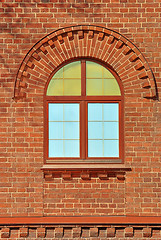 Image showing A window on red wall.