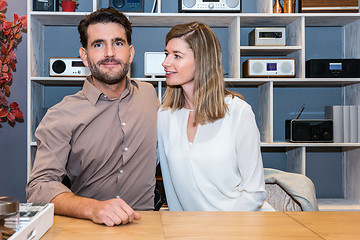 Image showing Couple At Counter In Electronics Store