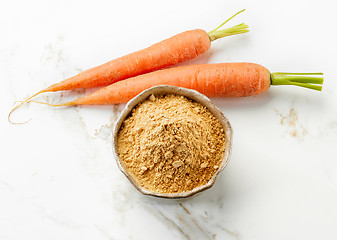 Image showing bowl of dried carrot powder