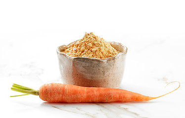 Image showing bowl of dried carrot powder