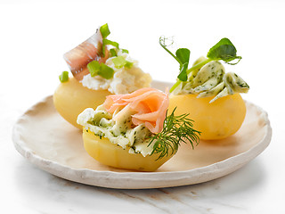 Image showing decorated boiled potatoes on plate