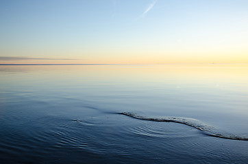 Image showing Smooth water and colorful sky