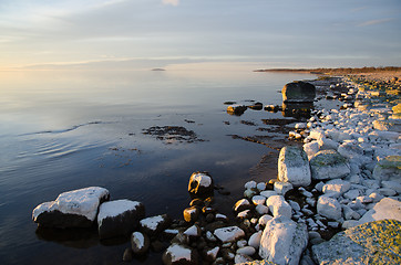 Image showing Coastal view with contrasting colors and smooth water
