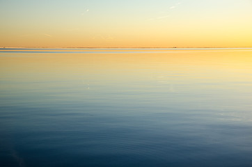 Image showing Sunset colors by an absolute calm water