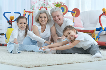 Image showing grandparents  and  granddaughters doing exercise