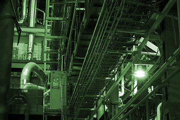 Image showing Equipment, cables and piping as found inside of a modern industr