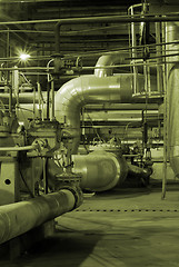 Image showing Pipes and tubes and chimney at a power plant