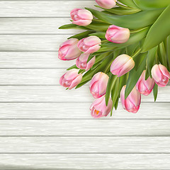 Image showing Spring tulips on wooden for design. EPS 10