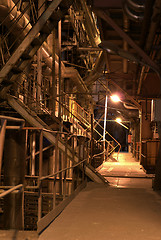 Image showing Pipes and tubes and chimney at a power plant