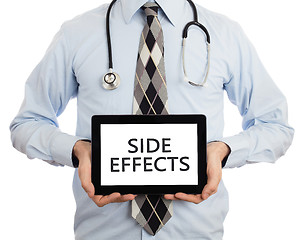 Image showing Doctor holding tablet - Side effects