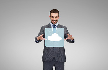 Image showing businessman working with cloud icon projection