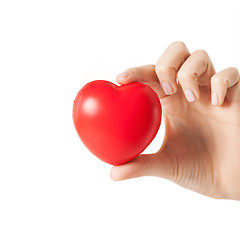 Image showing female hands with small red heart