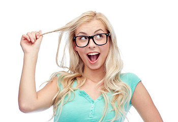 Image showing happy young woman or teenage girl in glasses