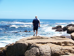 Image showing walking on rocks