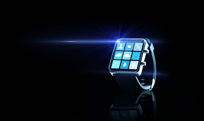 Image showing close up of black smartwatch with app icons