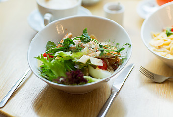 Image showing close up of caesar salad on plate at restaurant