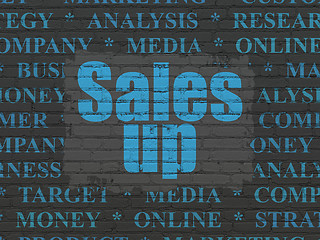 Image showing Advertising concept: Sales Up on wall background