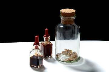 Image showing glass bottles with herbal extracts oils