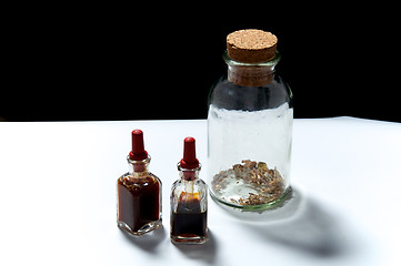 Image showing glass bottles with herbal extracts