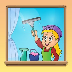 Image showing Woman cleaning window image 1