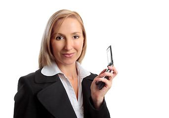 Image showing Working woman with mobile phone