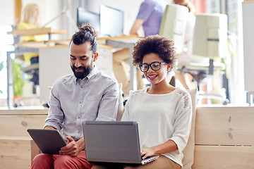 Image showing creative team with laptop and tablet pc in office