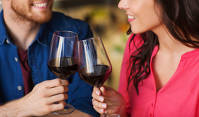 Image showing happy couple dining and drink wine at restaurant